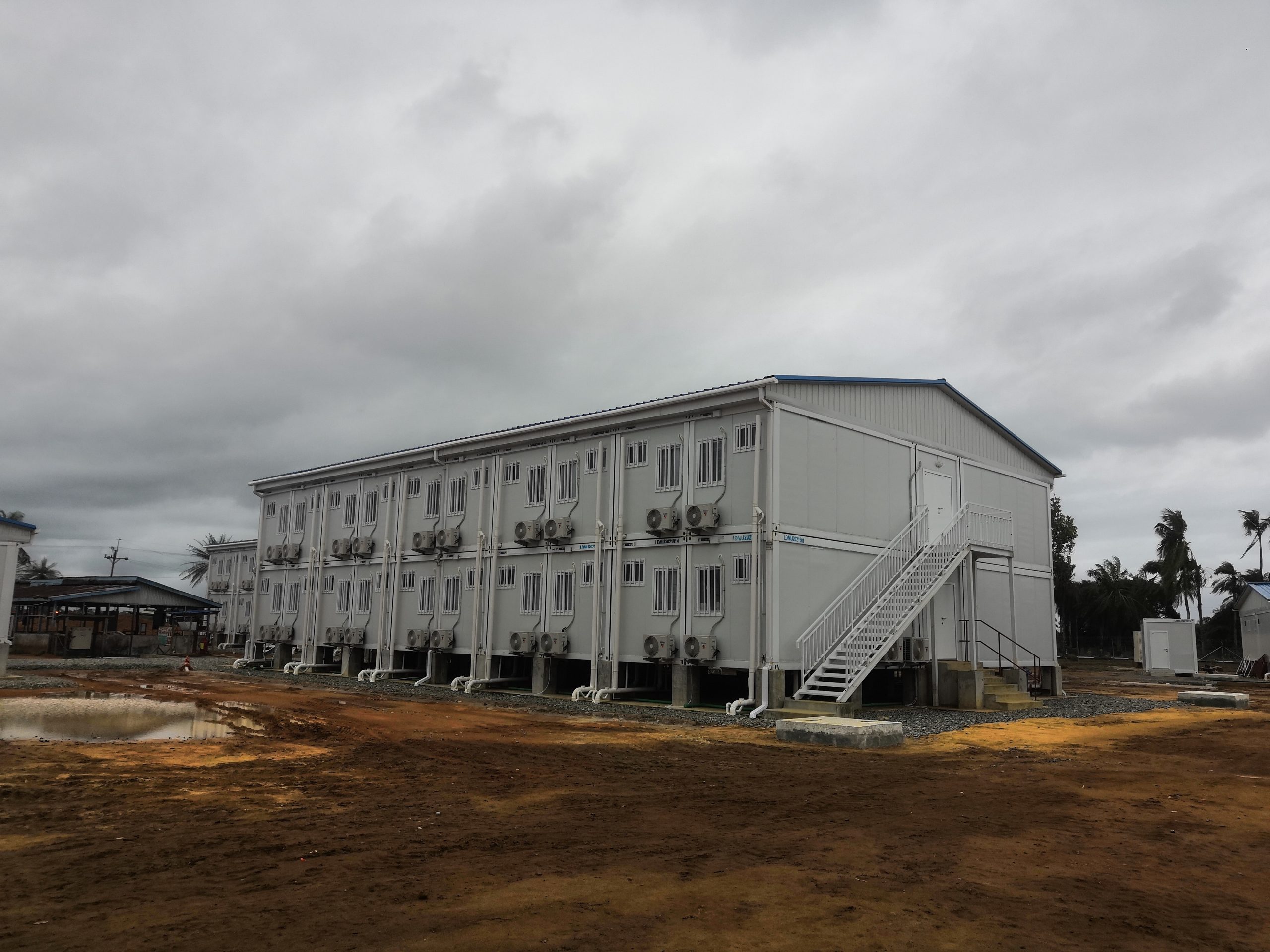 Container City' project embracing adaptable design and reusable modular building approach pioneered by Lida Group looks to transform concept of worker camps as long-term affordable communities