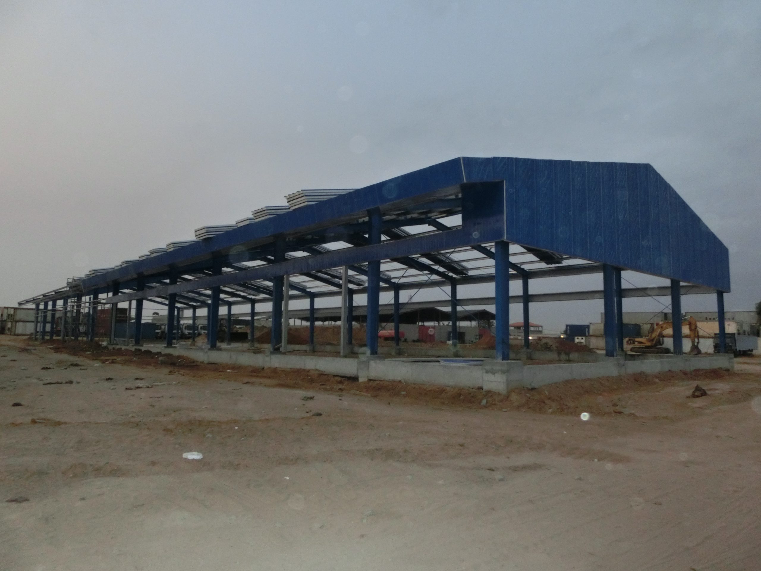 Prefabricated Steel Structure Warehouse Pre-Engineered Metal Architecture Prefab Steel Structure Parking Lot Workshop Building